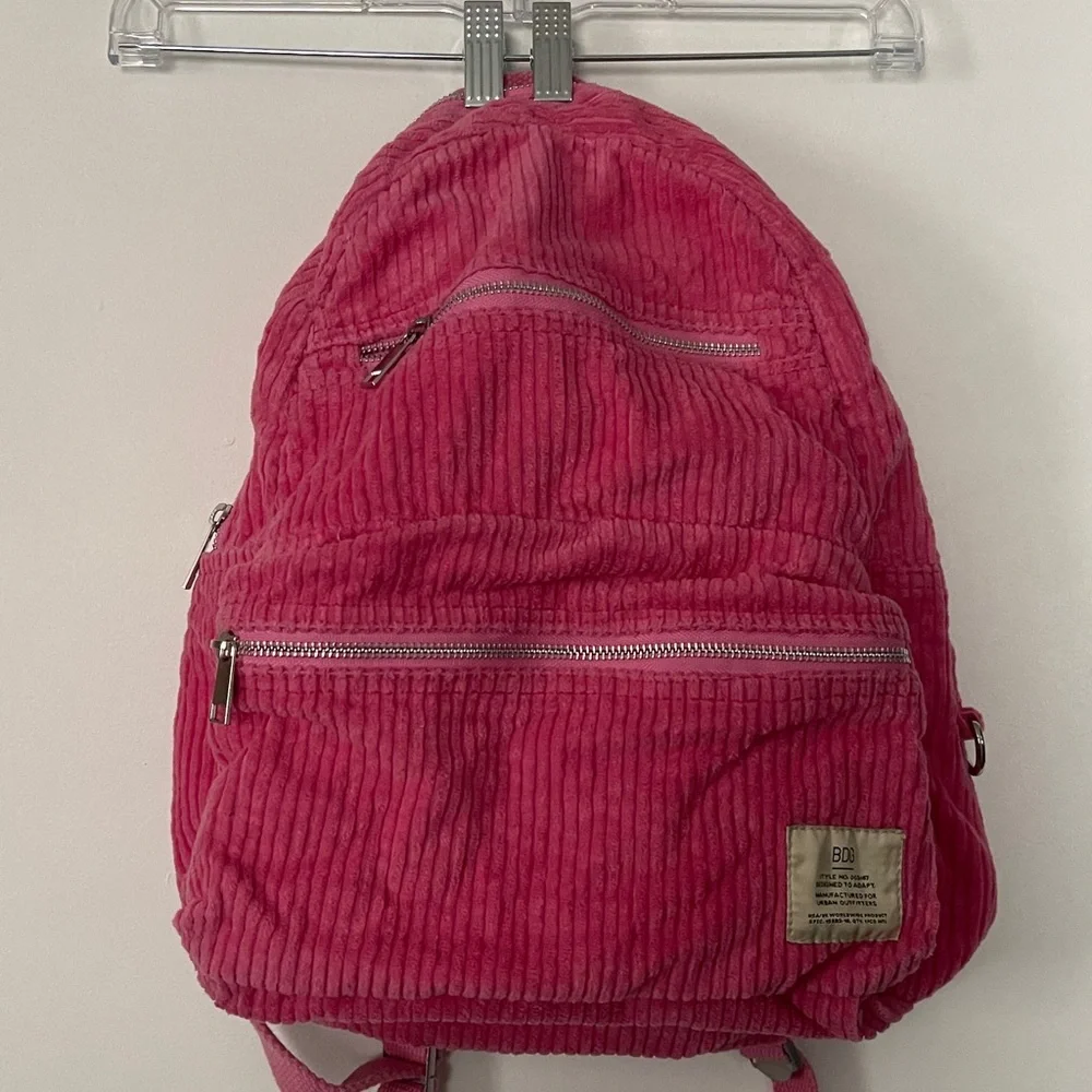 Pink urban outfitters corduroy backpack